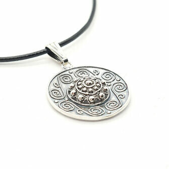 Medallón celta con botón charro